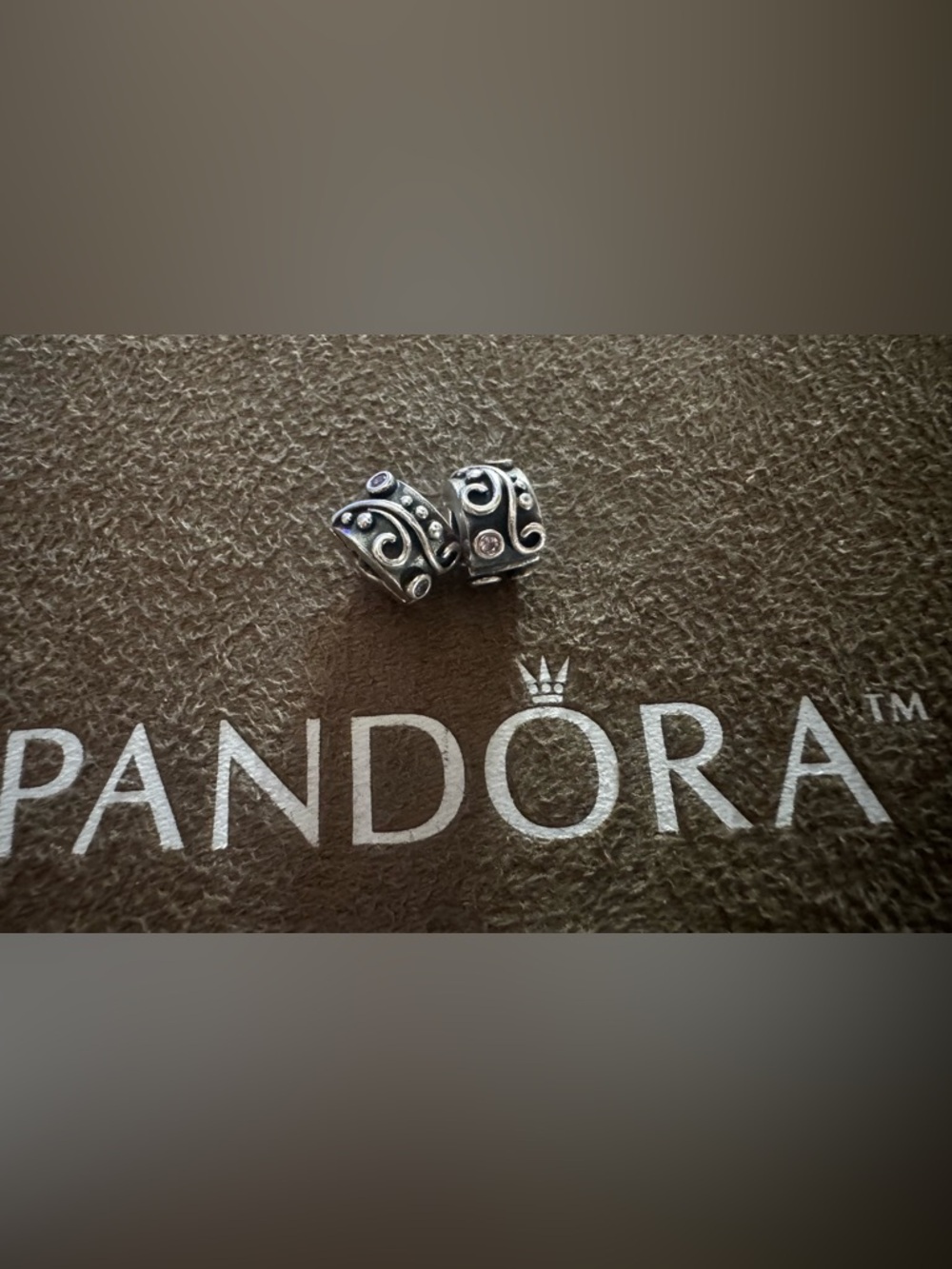 Two Authentic PANDORA Tendril
Clips with Pink stones